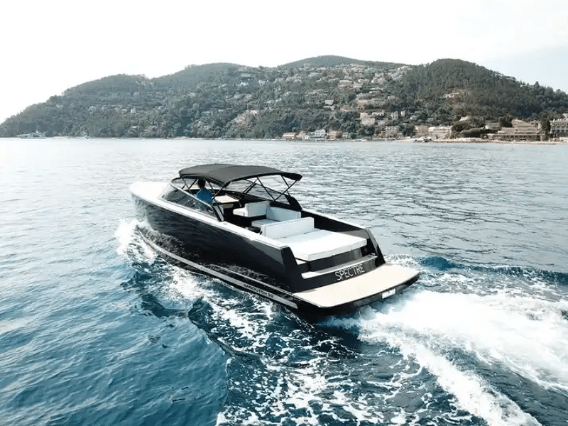 Stern view of VanDutch 32 sailing with the lounging area on display