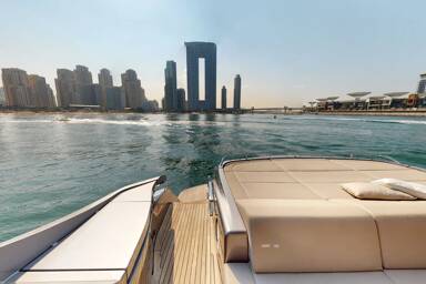 Relaxed seating and lounging area on the stern of Predator Pershing 8X in Dubai with Bluemoon